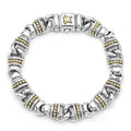 18K gold and sterling silver forms this curb link bracelet.