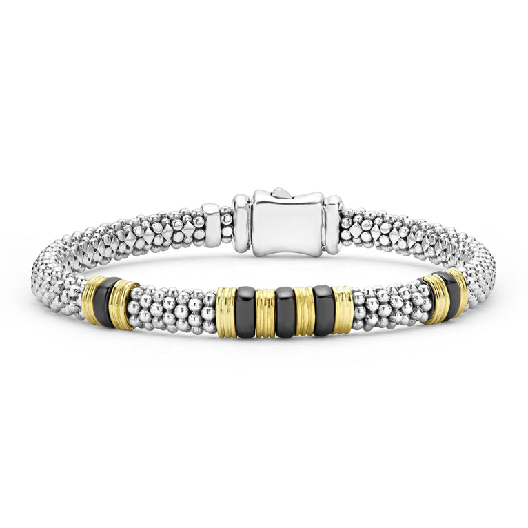 Three 18K gold and black ceramic stations set in sterling silver Caviar beading.