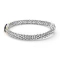 side of 6mm sterling silver beaded diamond bracelet with black ceramic and gold details