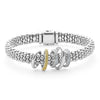Smooth sterling silver, 18K gold superfine Caviar beading, and diamonds form five stationary rings on a classic sterling silver Caviar rope bracelet. LAGOS diamonds are the highest quality natural stones.