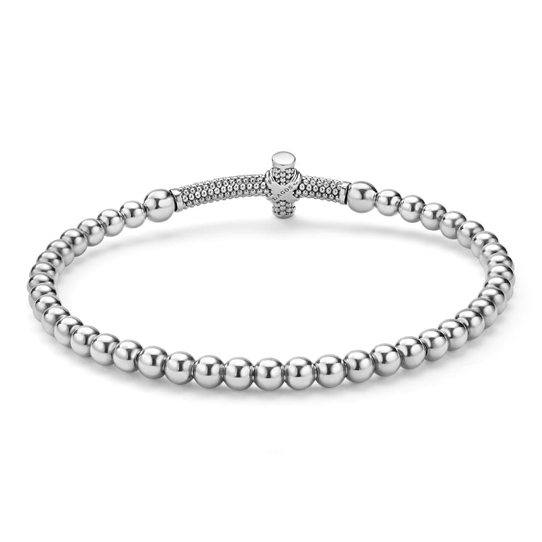 back of everyday stretch bracelet with beaded sterling silver and gold cross detail