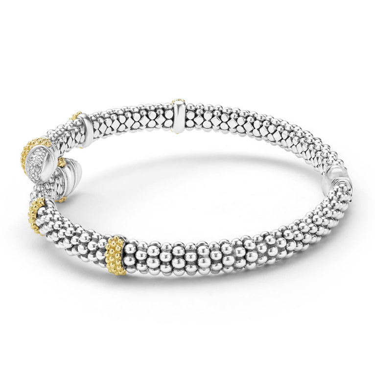 side of 5mm sterling silver bypass bracelet with gold and diamond accents