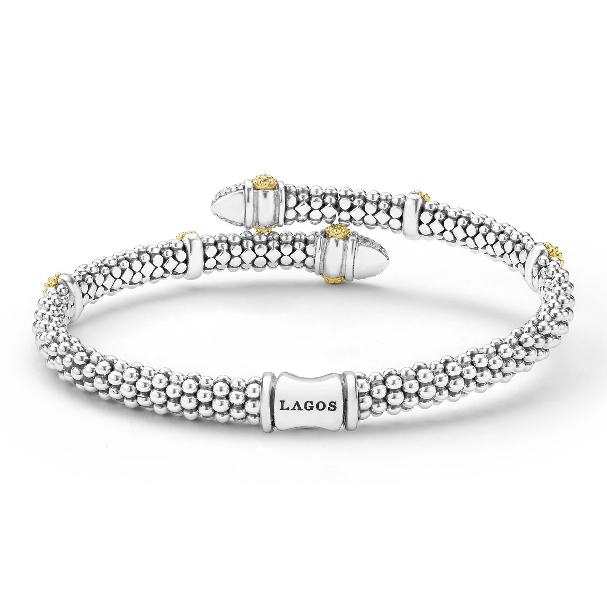 back of 5mm sterling silver bypass bracelet with gold and diamond accents and LAGOS engraving