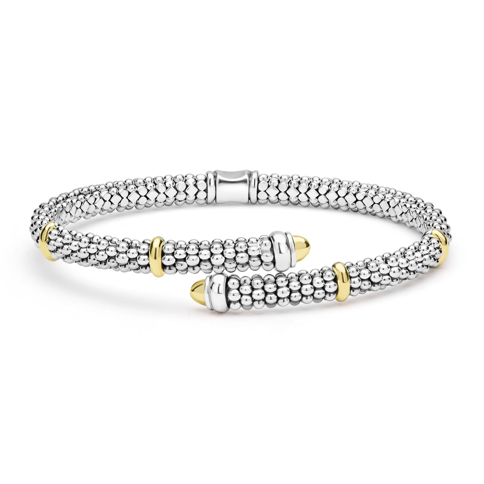 Front of 5mm sterling silver bypass beaded bracelet with gold stations