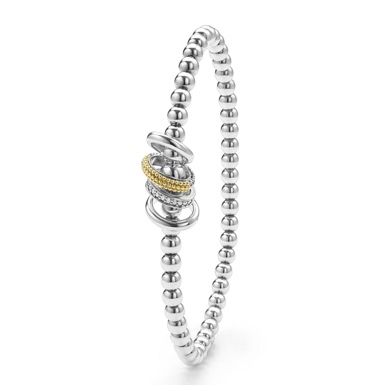 upright sterling silver beaded stretch bracelet with diamonds and gold ring details 