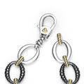 clasp of sterling silver link bracelet with gold and black ceramic beading 
