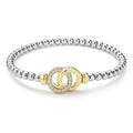 front of everyday sterling silver beaded stretch bracelet with interlocking diamonds and gold details 