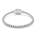 back of everyday sterling silver beaded stretch bracelet with interlocking diamonds and gold details 