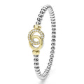 upright everyday sterling silver beaded stretch bracelet with interlocking diamonds and gold details 