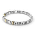 side of 5mm sterling silver cuff-style bracelet with gold beaded accents