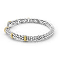 side of 5mm Sterling silver cuff-style bracelet with gold and diamond accents