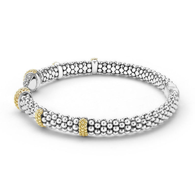 side of 5mm Sterling silver cuff-style bracelet with gold and diamond accents