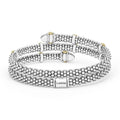 back of 5mm sterling silver wrap bracelet with gold and diamond accents and LAGOS engraving