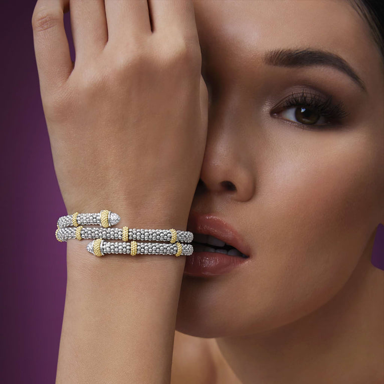 woman wearing 5mm sterling silver wrap bracelet with gold and diamond accents on wrist