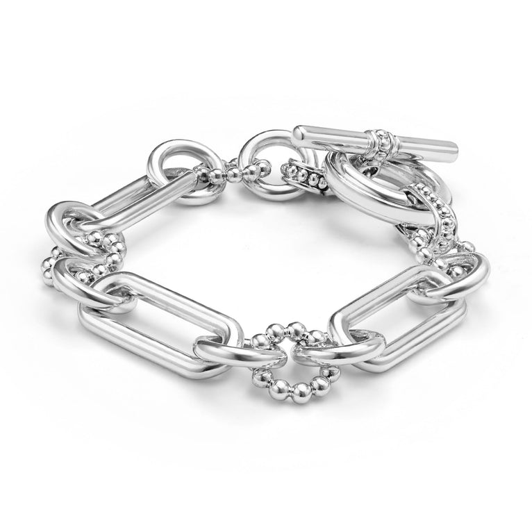 Signature Caviar Sterling Silver Link Bracelet featuring alternating elongated oval and beaded circle links with a toggle clasp, showcasing refined craftsmanship and modern design.