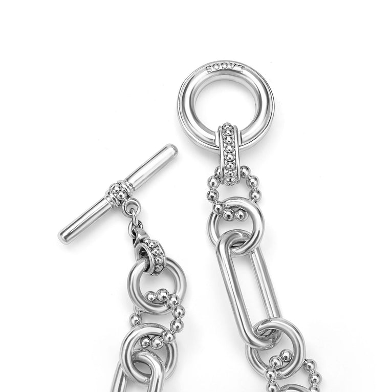 Signature Caviar Sterling Silver Link Bracelet featuring a toggle-clasp design with interwoven beaded and smooth links, showcasing modern elegance and craftsmanship.