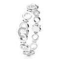 Signature Caviar Silver Interlocking Diamond Link Bracelet featuring cascading silver-tone dangle earrings with open circle links, some adorned with pavé-set diamonds, embodying elegance and sophistication.