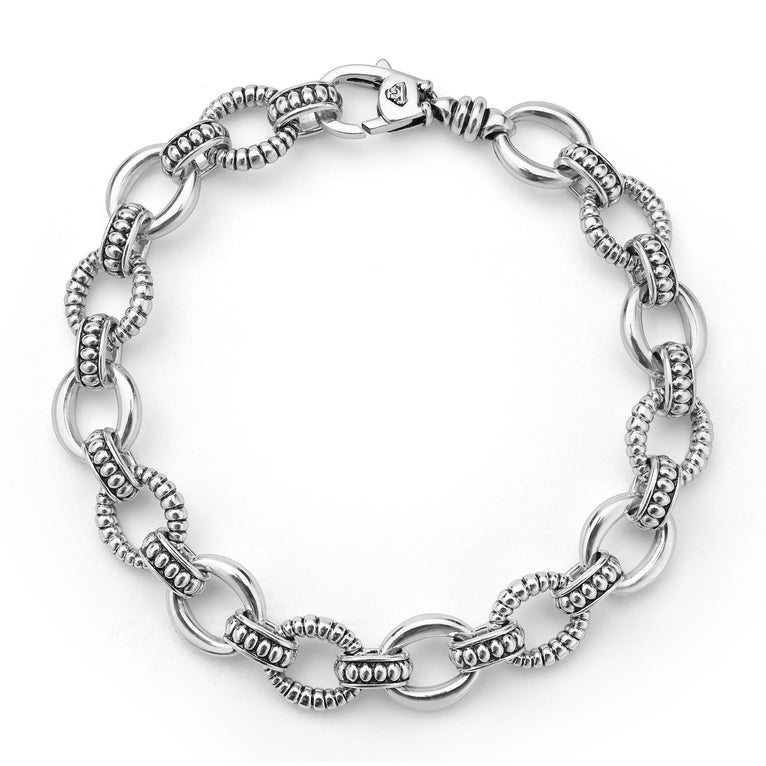 Signature Caviar Sterling Silver Fluted Oval Link Bracelet with alternating smooth and textured links, showcasing LAGOS craftsmanship and elegance in fine jewelry design.