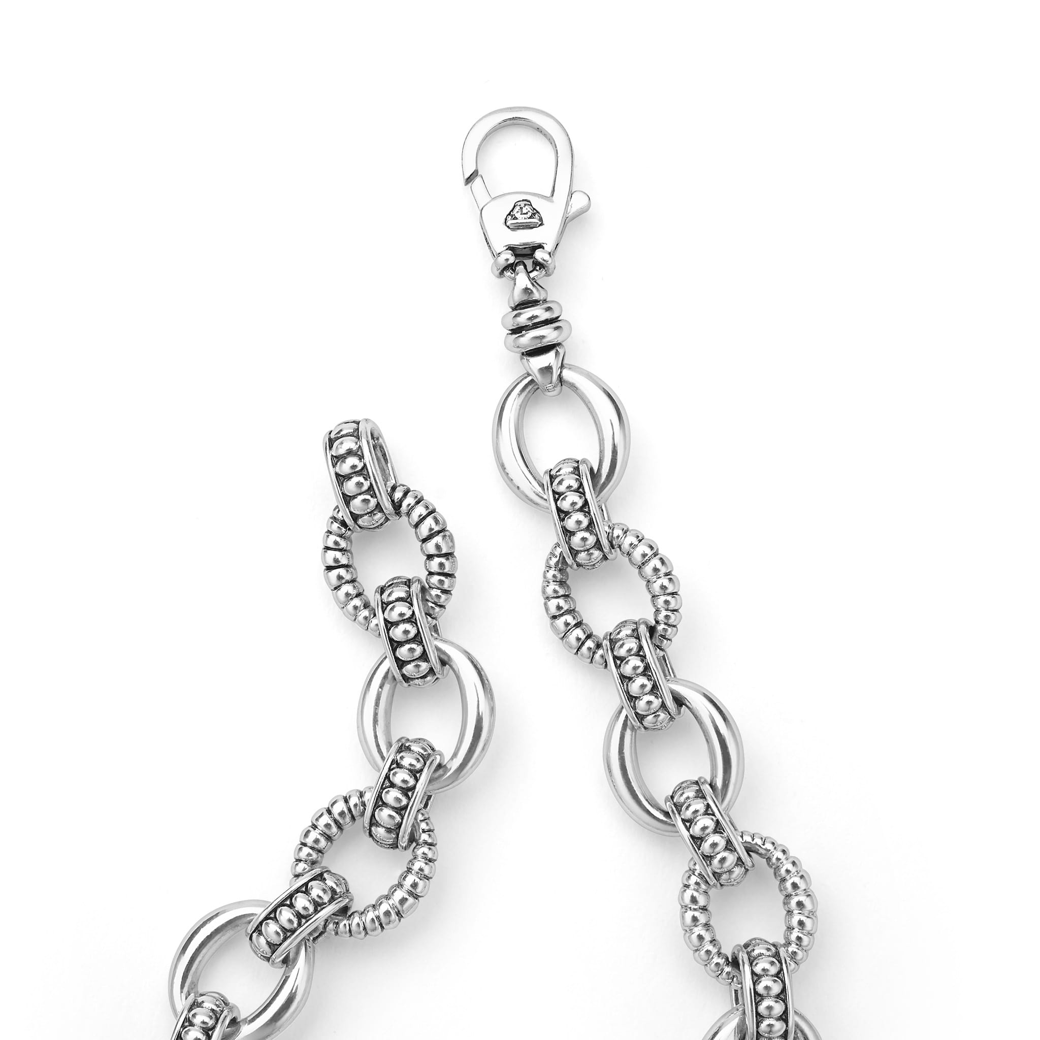 Signature Caviar Sterling Silver Fluted Oval Link Bracelet featuring alternating smooth and beaded loops with a lobster clasp, highlighting LAGOS elegance and craftsmanship.