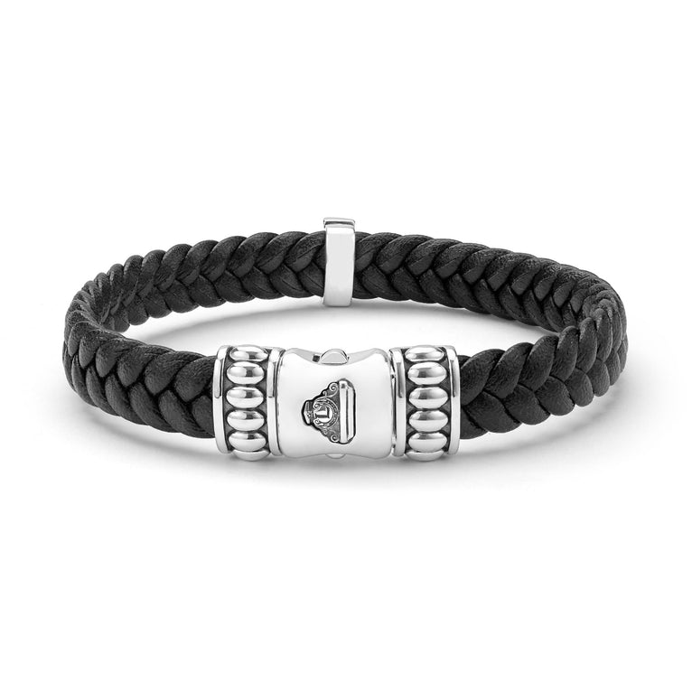 Anthem Two-Tone Braided Vegan Leather Cross Bracelet features black braided cords and a polished silver-tone clasp, showcasing refined craftsmanship and modern elegance.