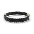 Anthem Two-Tone Braided Vegan Leather X Bracelet, featuring black braided leather with silver and gold accents, showcasing an elegant 18k gold X design.