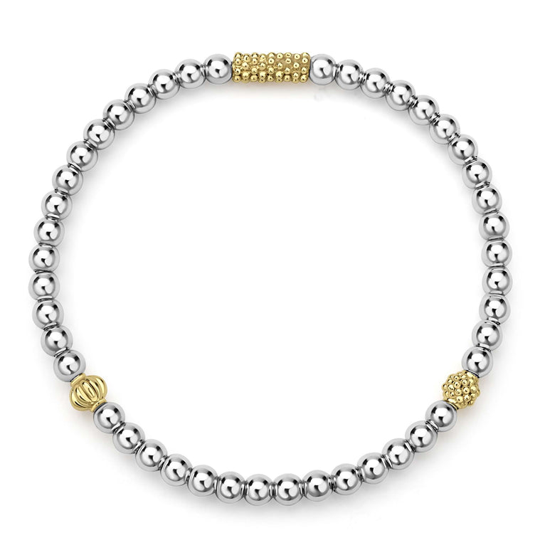 Caviar Icon Two-Tone Stretch Bracelet with polished silver spheres and gold accents, showcasing refined elegance and modern texture.