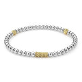 Caviar Icon Two-Tone Stretch Bracelet: polished silver spheres with gold-tone accents, showcasing LAGOS signature Caviar beading for elegant, versatile wear.