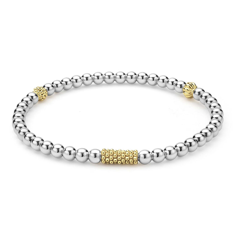 Caviar Icon Two-Tone Stretch Bracelet: polished silver spheres with gold-tone accents, showcasing LAGOS signature Caviar beading for elegant, versatile wear.