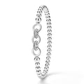 upright view of silver bracelet with interlocking circle design on a white background