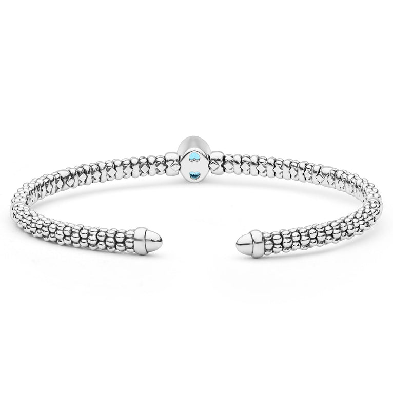  3mm features sterling silver snake-style beaded chains, 14K gold accents, and a vivid blue topaz centerpiece.