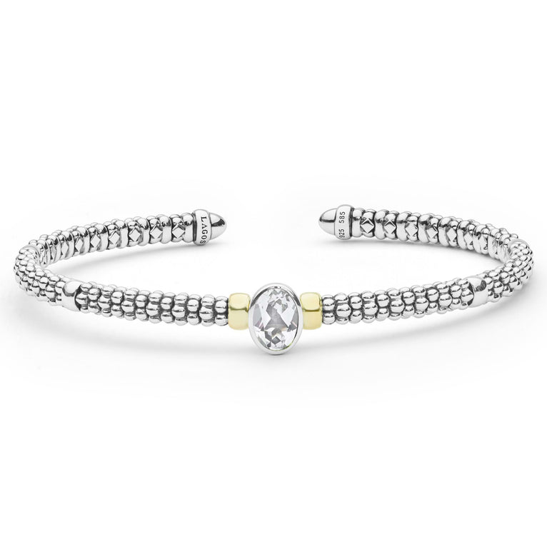 Signature Caviar Two-Tone White Topaz Oval Mini Versa Torque Bracelet in sterling silver with caviar beading, featuring a central faceted white topaz and 14K gold accents.