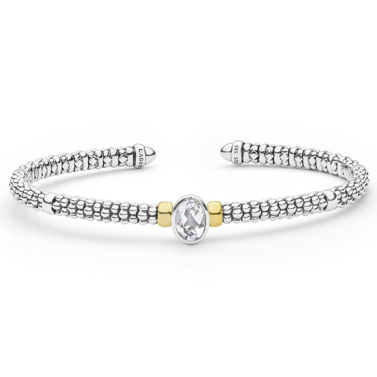 Signature Caviar Two-Tone White Topaz Oval Mini Versa Torque Bracelet in sterling silver with 14K gold accents, featuring caviar beading and a central oval white topaz stone.