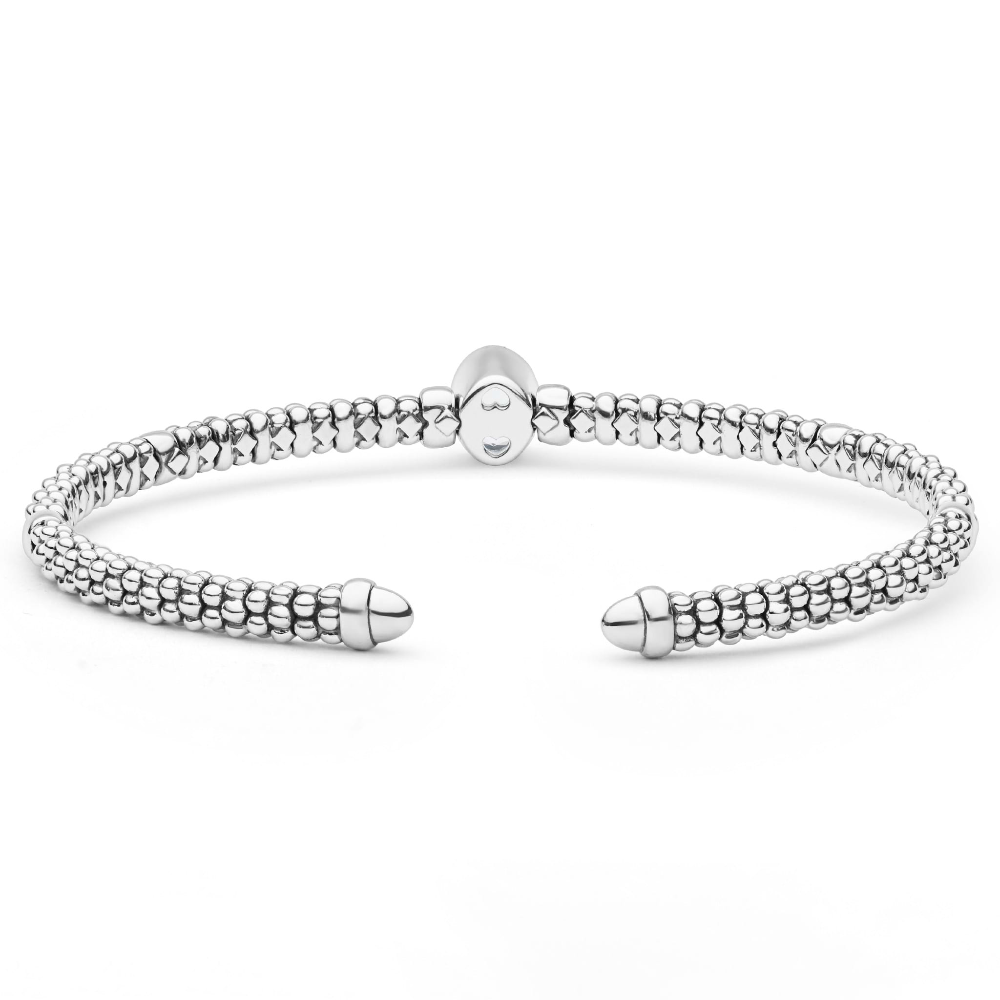  3mm: Sterling silver cuff with caviar beading, 14K gold accent, and oval white topaz centerpiece.