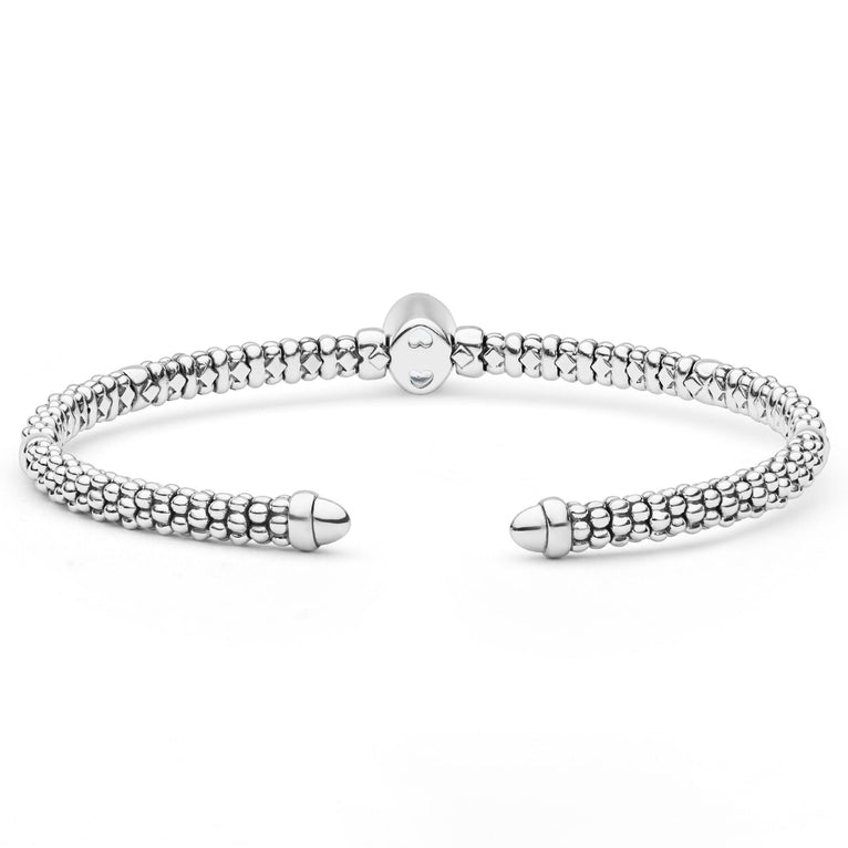  3mm: Sterling silver cuff with caviar beading, 14K gold accent, and oval white topaz centerpiece.