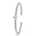 Signature Caviar Two-Tone White Topaz Oval Mini Versa Torque Bracelet in sterling silver with 14K gold accents, featuring caviar beading and a radiant white topaz gemstone.