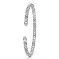 Sterling silver cuff bracelet with diamond end caps