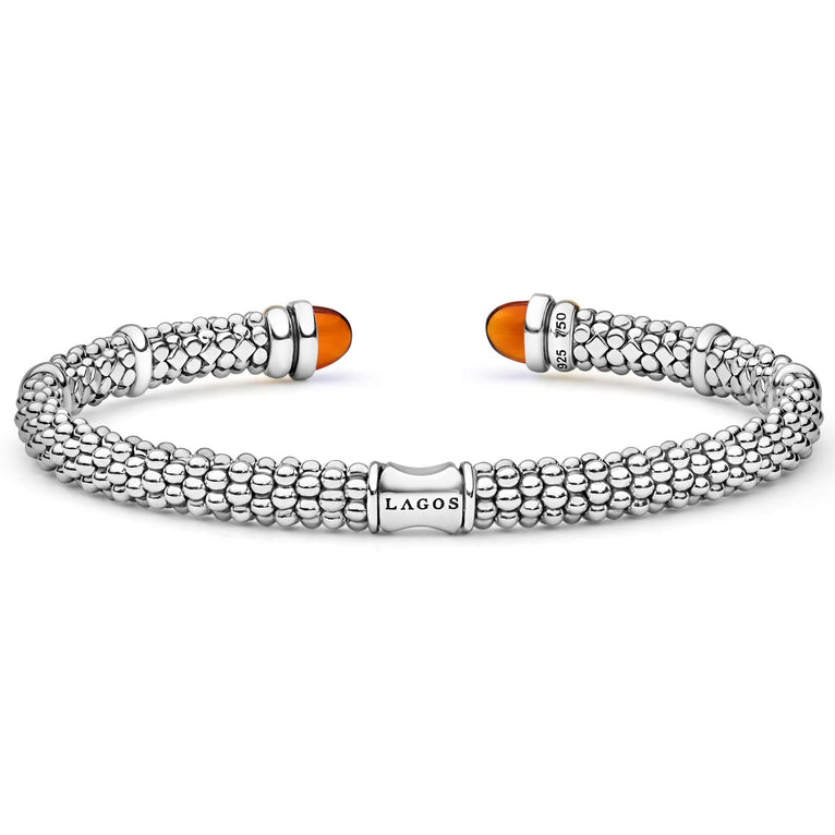 Sterling silver cuff with caviar beading, 14K gold accents, and amber-colored citrine gemstone end caps.