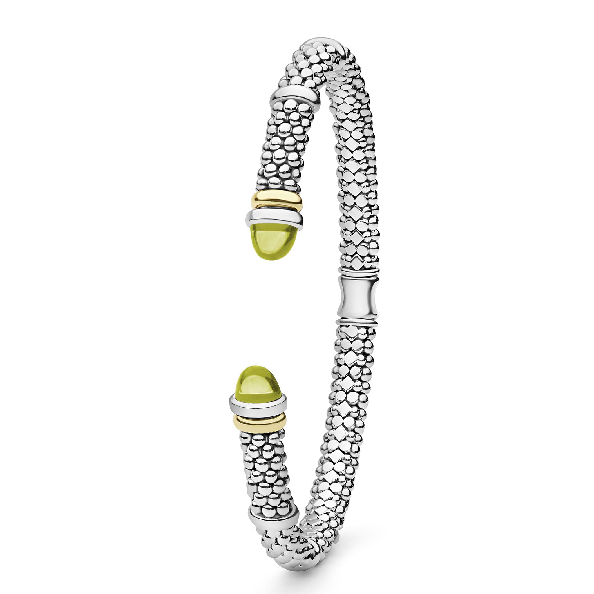 Signature Caviar Two-Tone Green Quartz Versa Torque Bracelet features polished sterling silver, 14K gold accents, caviar beading, and green quartz cabochon end caps.