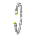 Signature Caviar Two-Tone Green Quartz Versa Torque Bracelet features polished sterling silver, 14K gold accents, caviar beading, and green quartz cabochon end caps.
