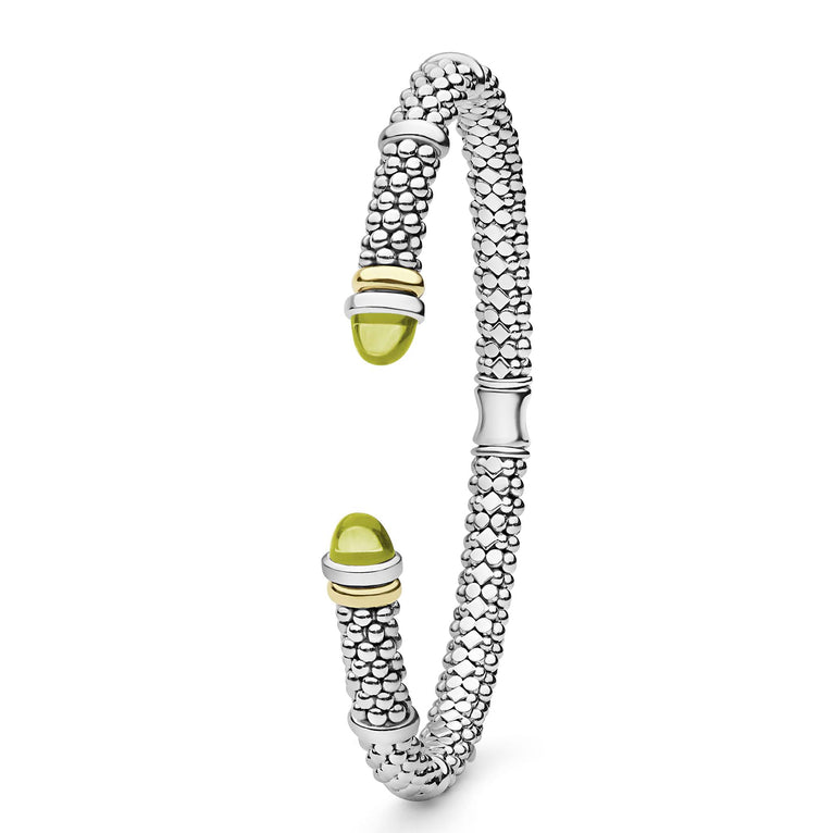 Signature Caviar Two-Tone Green Quartz Versa Torque Bracelet features polished sterling silver, 14K gold accents, caviar beading, and green quartz cabochon end caps.