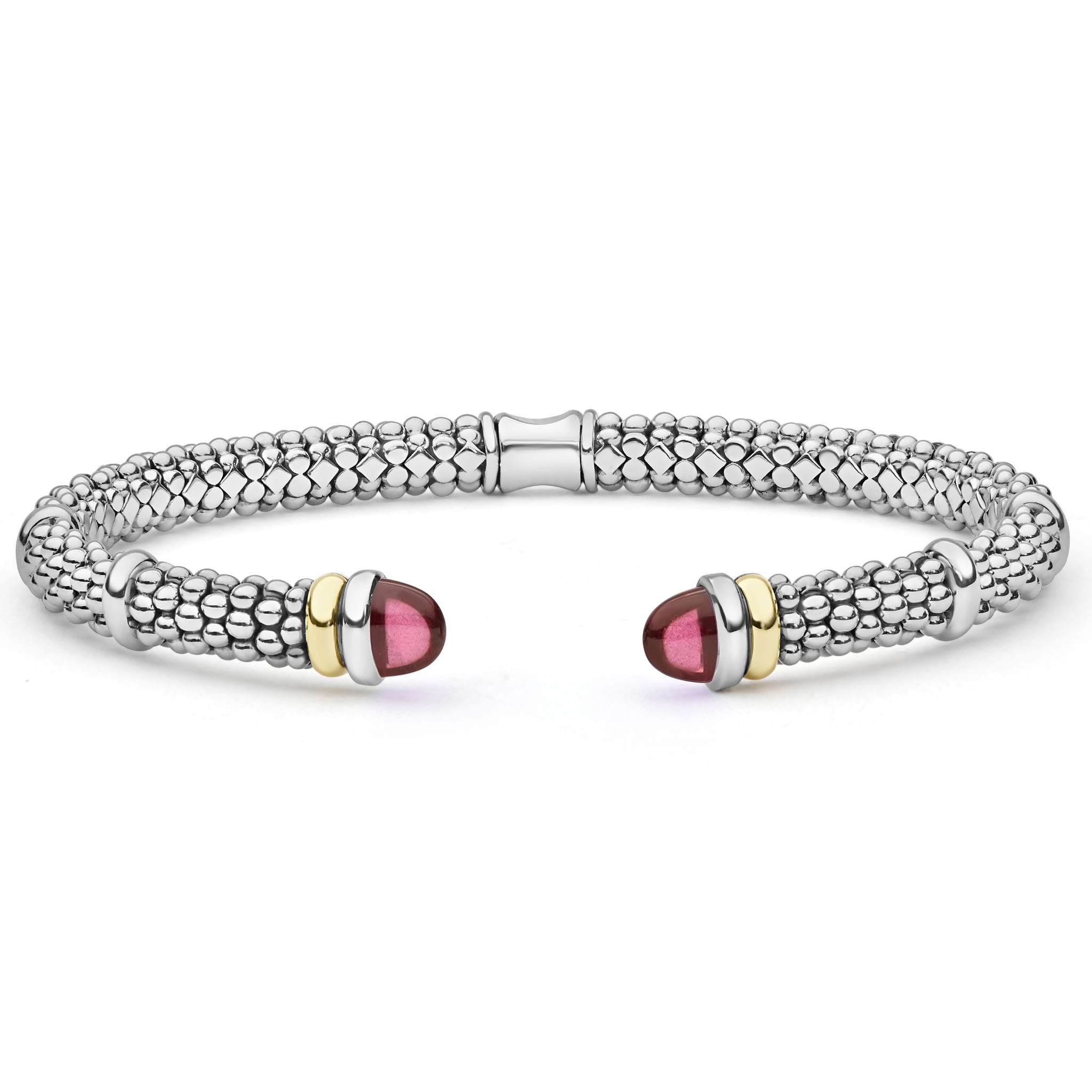  5mm: A sterling silver cuff with 14K gold accents and garnet cabochons, showcasing refined craftsmanship and bold elegance.