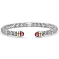  5mm: A sterling silver cuff with 14K gold accents and garnet cabochons, showcasing refined craftsmanship and bold elegance.