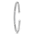 Caviar Spark Sterling Silver Diamond Station Mini Versa Torque Bracelet features caviar beading, crisscross pattern, pavé stone section, and LAGOS branding on a 3mm open cuff.