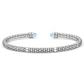 Signature Caviar Two-Tone Swiss Blue Topaz Mini Versa Torque Bracelet in sterling silver with 14K gold accents, featuring caviar beading and Swiss blue topaz end caps.