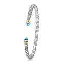 Signature Caviar Two-Tone Swiss Blue Topaz Mini Versa Torque Bracelet in sterling silver with caviar beading, 14K gold accents, and blue topaz gemstone caps, showcasing modern elegance.