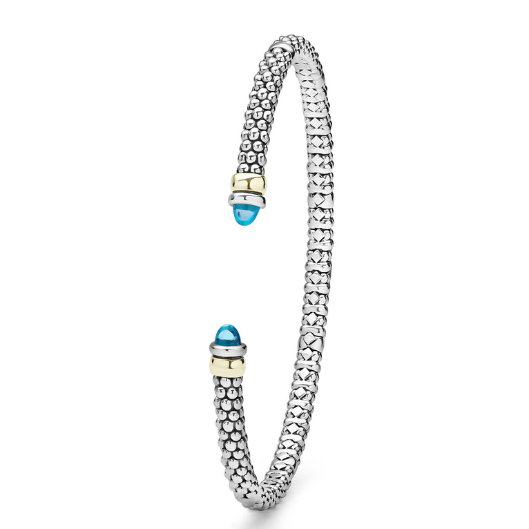 Signature Caviar Two-Tone Swiss Blue Topaz Mini Versa Torque Bracelet in sterling silver with 14K gold accents, featuring caviar beading and Swiss blue topaz end caps.