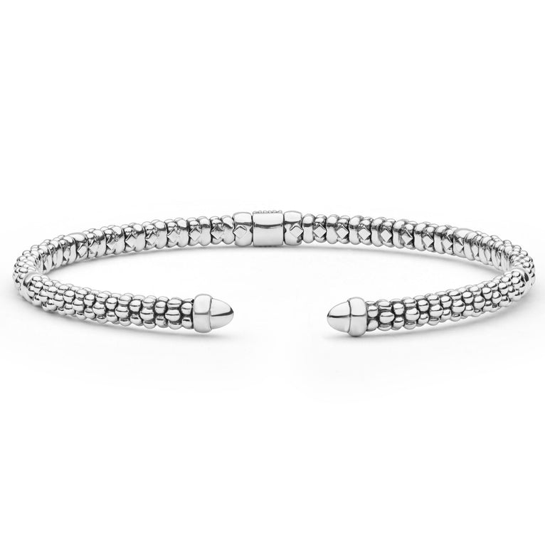  3mm features sterling silver caviar beading, 14K gold accents, and diamond stations in an open-cuff design.
