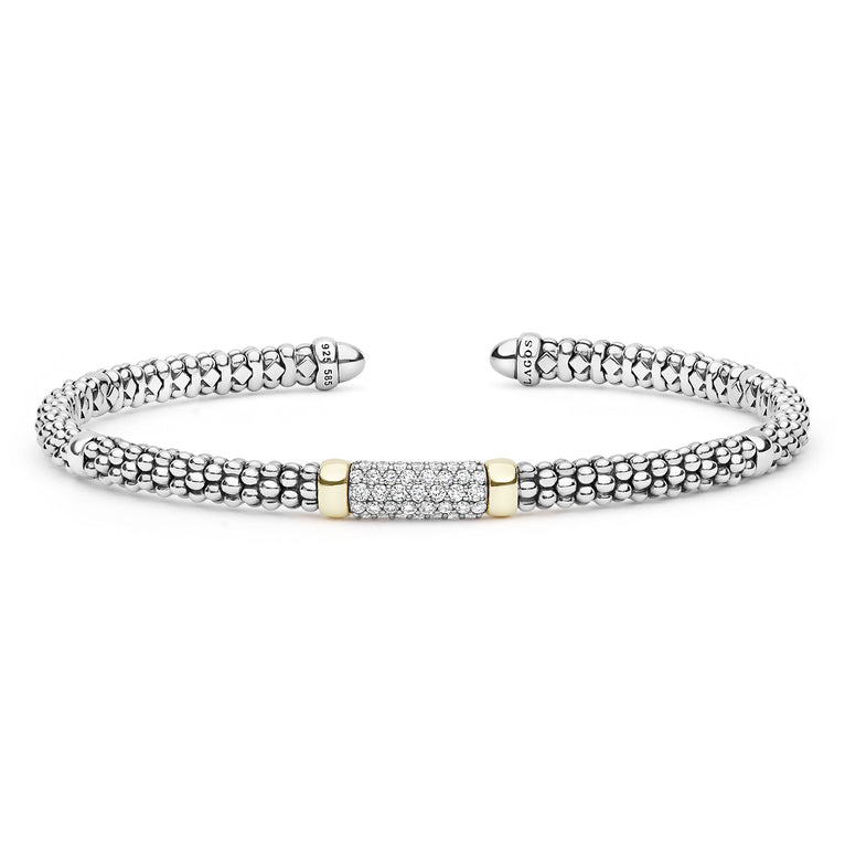 A silver cuff bracelet with a textured beaded outer band, a central pavé diamond-set rectangular section, and two small gold accent bands.