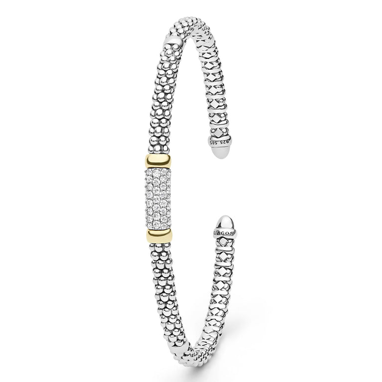 Signature Caviar Two-Tone Medium Diamond Station Mini Versa Torque Bracelet in sterling silver, featuring 14K gold accents and pavé-set diamonds with Caviar beading, showcasing LAGOS craftsmanship.