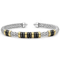 Black Caviar Two-Tone Five Station Black Ceramic Versa Torque Bracelet, featuring sterling silver caviar beading and 18K gold accents, with five black ceramic stations.